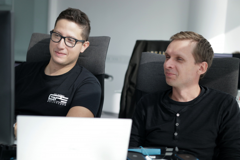 Developers Nik and Matija working in Celje office